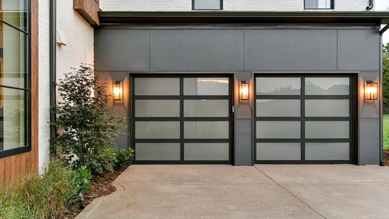 A garage with two glass garages