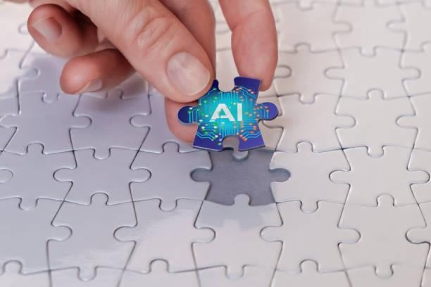 Artificial intelligence concept The businesswoman places the last piece of the puzzle, the concept of artificial intelligence. ai stock pictures, royalty-free photos & images