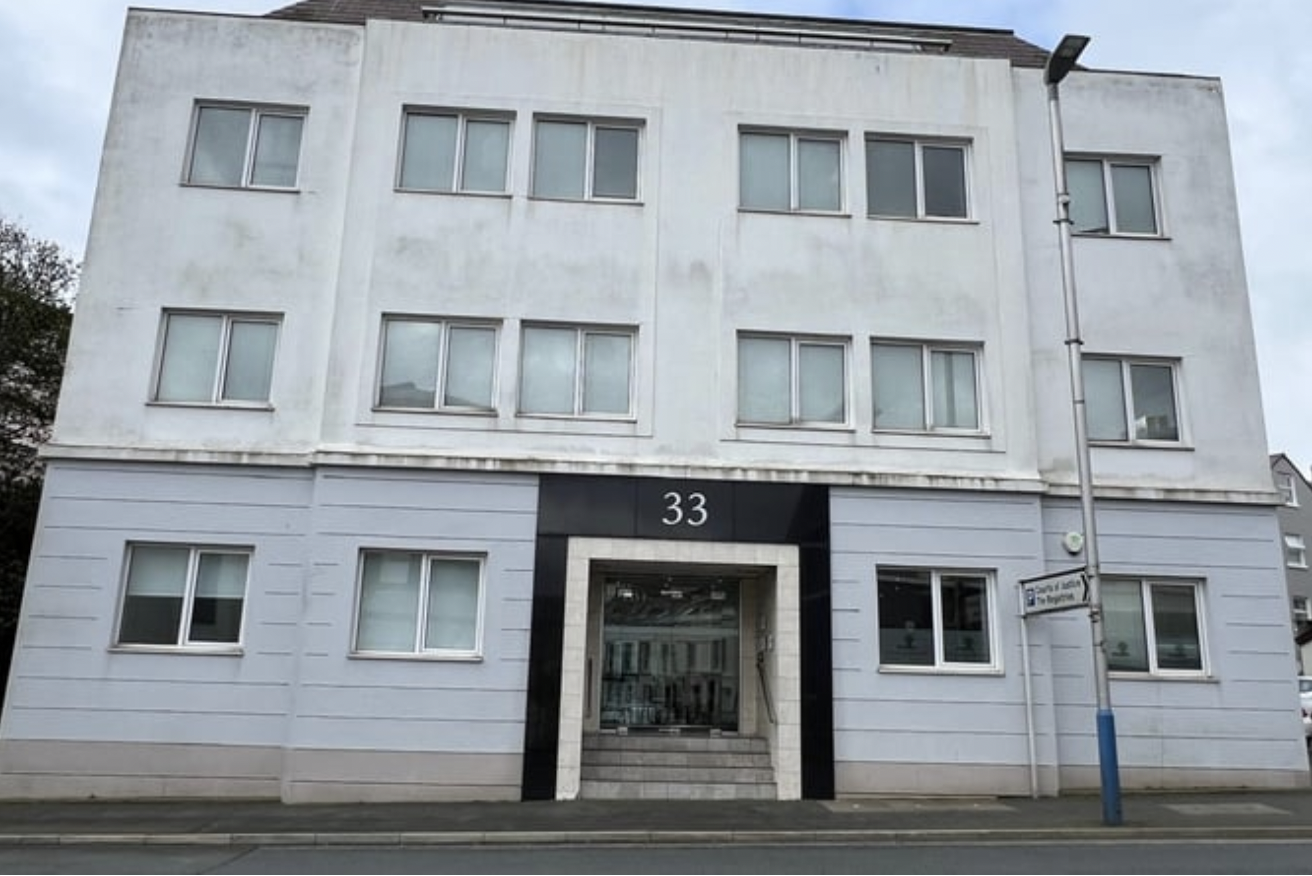 A building with a number on the front

Description automatically generated