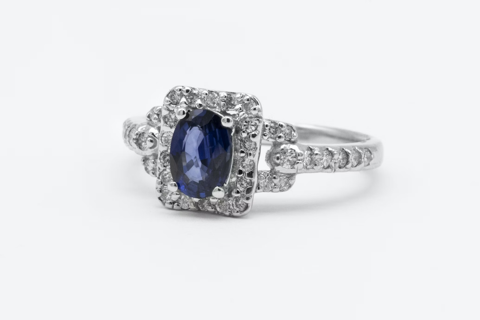 A silver ring with a blue gemstone