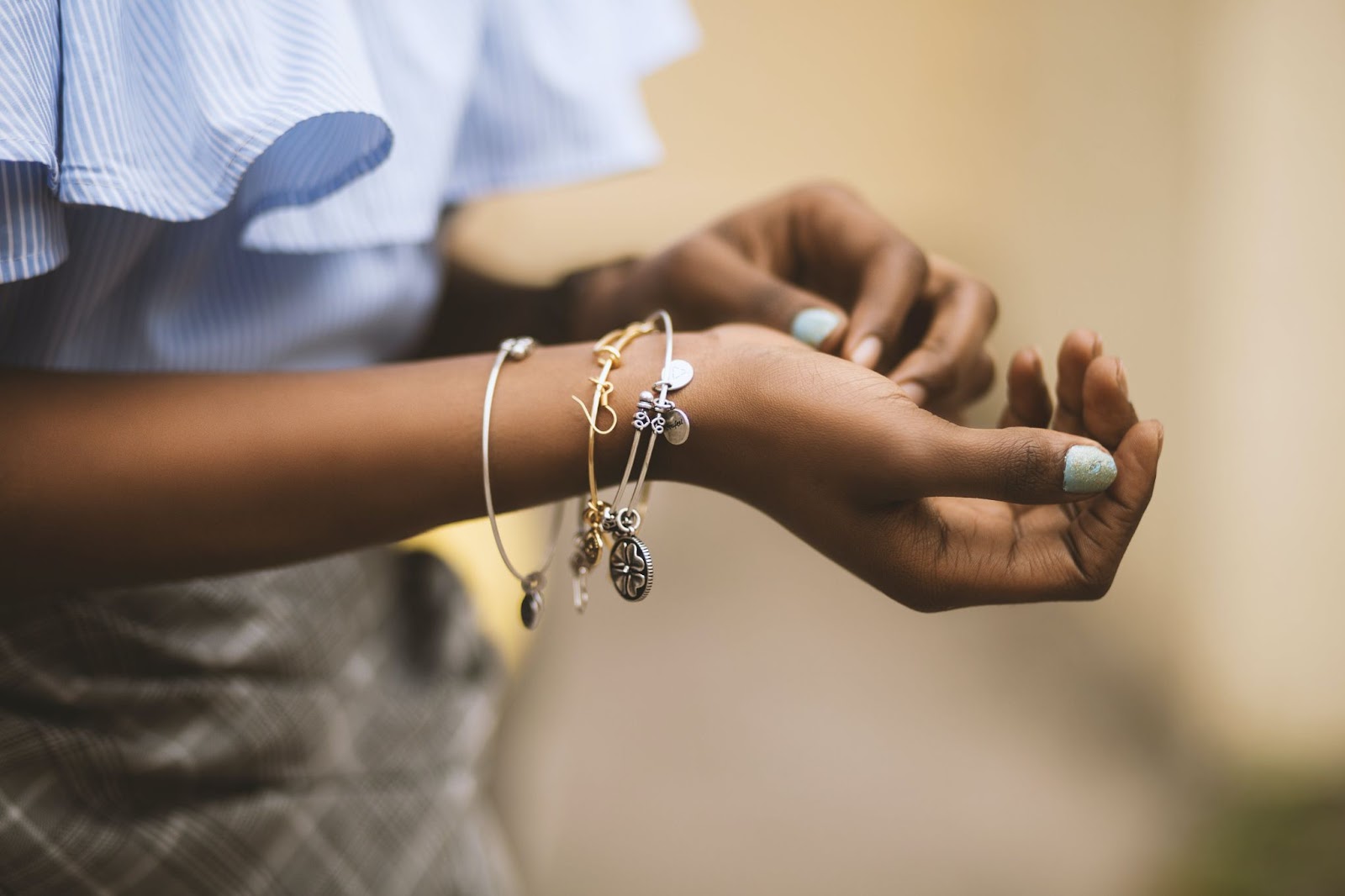 Bracelets that can be bought at both Mejuri and Monica Vinader.