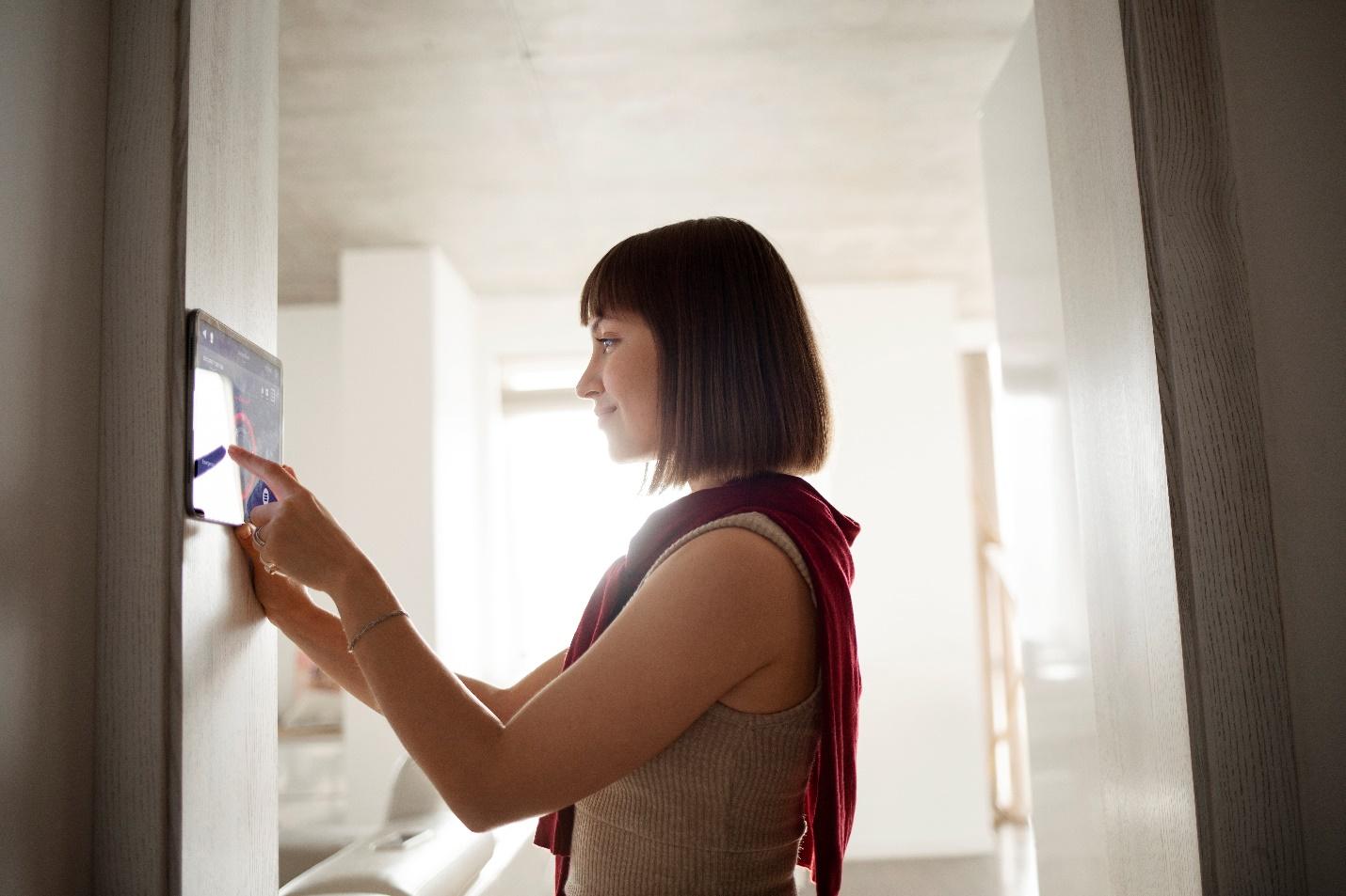 C:\Users\DELL\Downloads\young-woman-using-home-technology.jpg