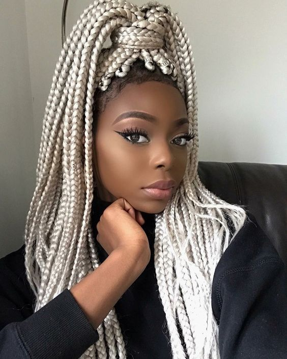 Picture of a lady wearing the gorgeous milky white braids 