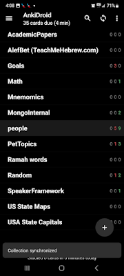 Smartphone screenshot. White text on black background. The open app is titled Ankidroid. On the left side of the screen are bolded names of decks of flashcards. On the right are numbers showing the number of expected reviews for each deck.