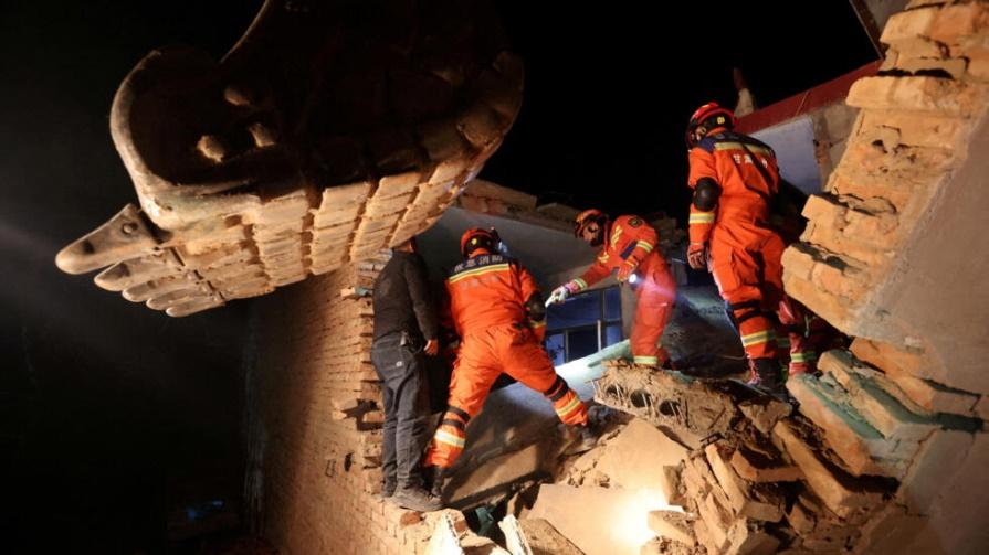 Rescue workers conduct search and rescue operations at Kangdiao village following the earthquake in Jishishan county, Gansu province, China December 19, 2023.