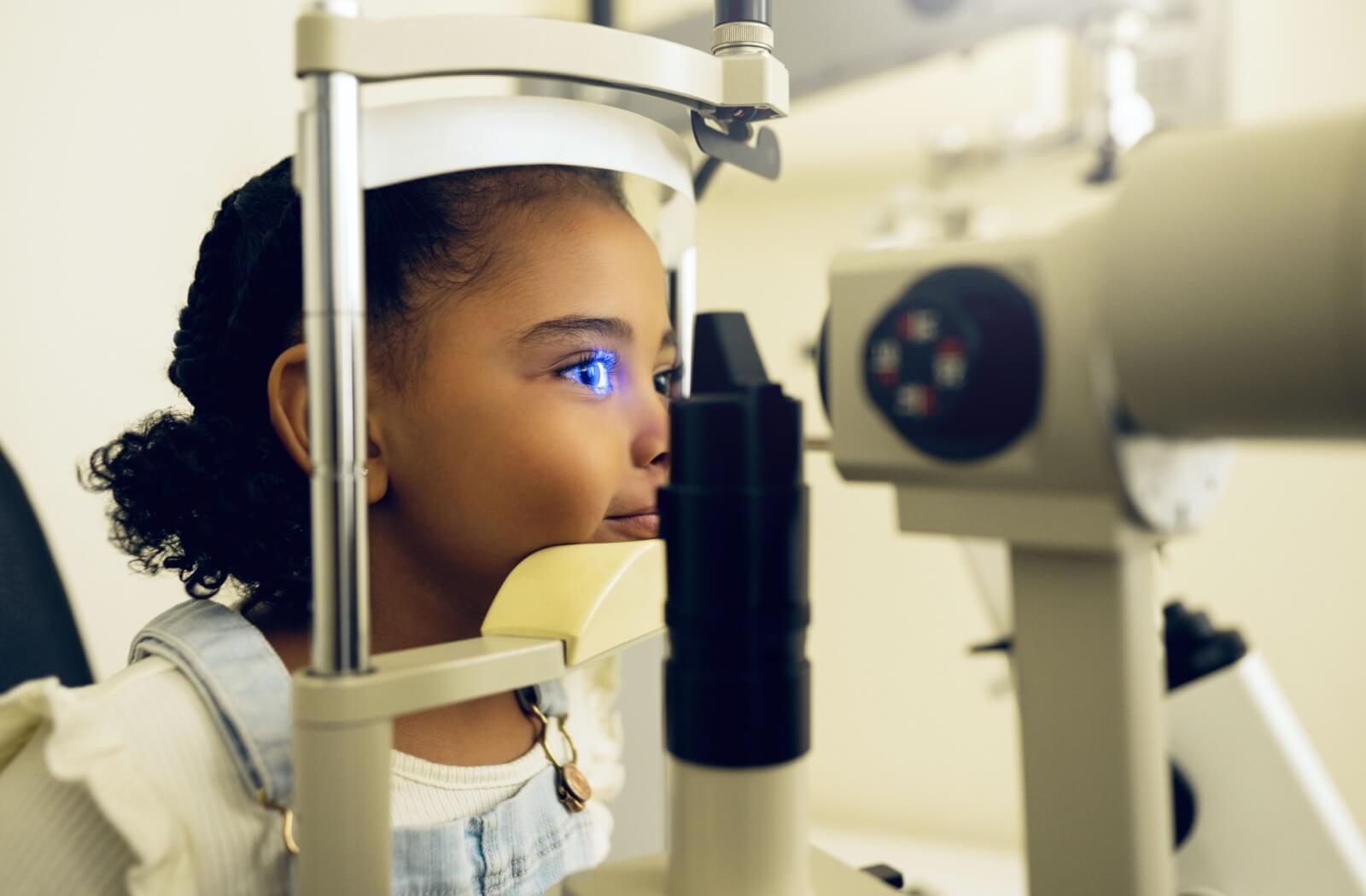 A young girl being checked for juvenile glaucoma.