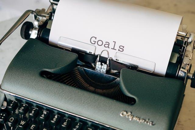 The word GOALS on a paper in a typewriter
