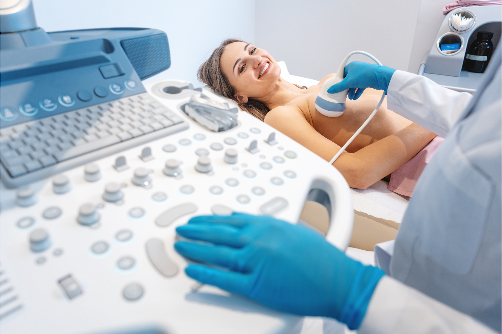 woman having a breast ultrasound performed