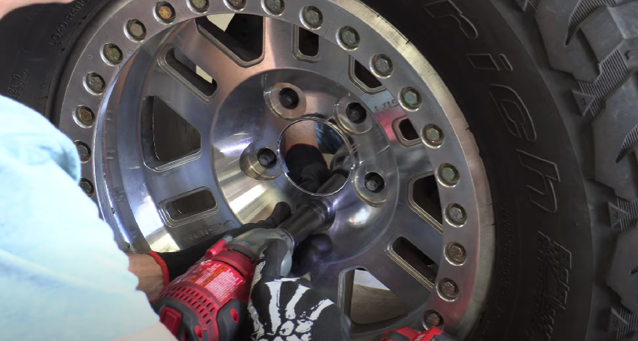 Secure Lug Nuts and Lower Vehicle
