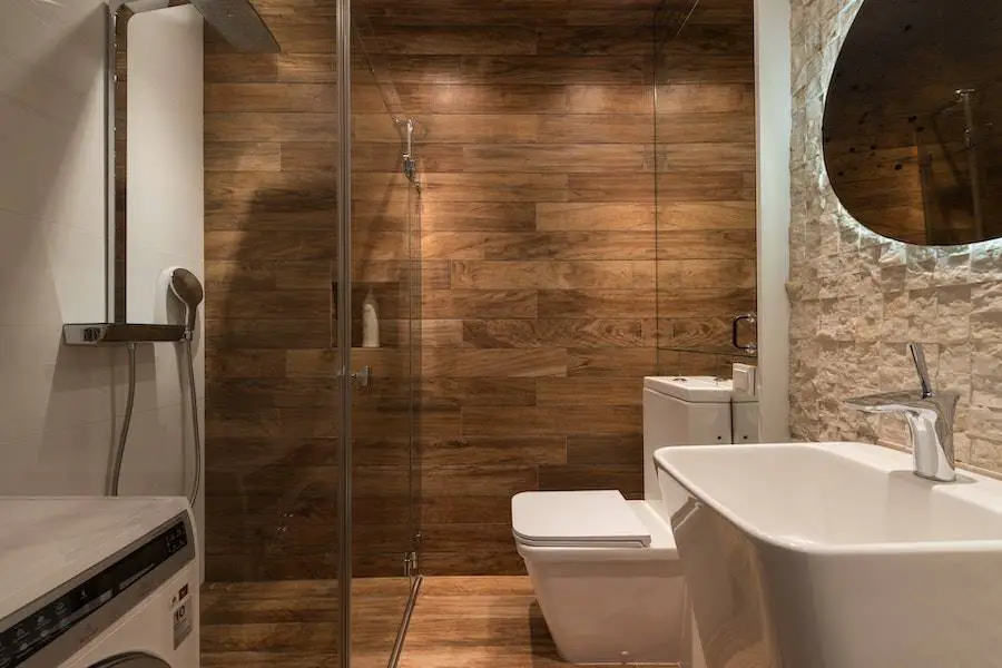 Picture shows an attached bathroom of a hotel room. Attached bathrooms are usually small for budgeted rooms.