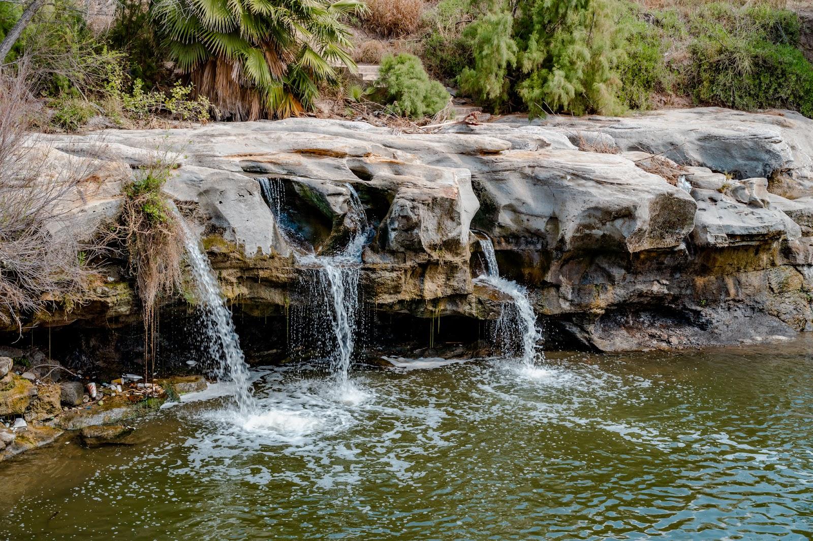 a water falling into a body of water