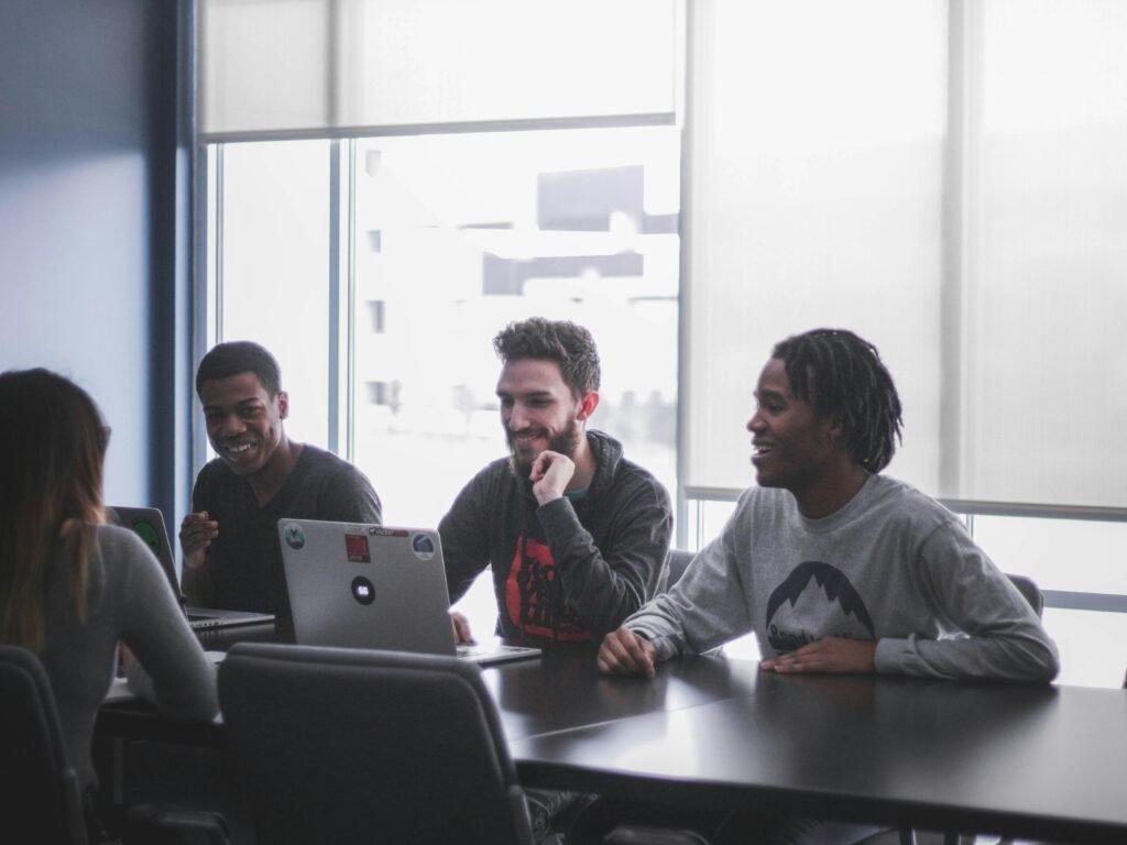 students looking for options on laptop - credible source checker