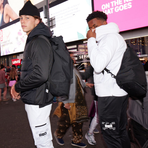 Two male athletes pairing their Battle Athlete hoodies with Battle athletic joggers and sweatpants
