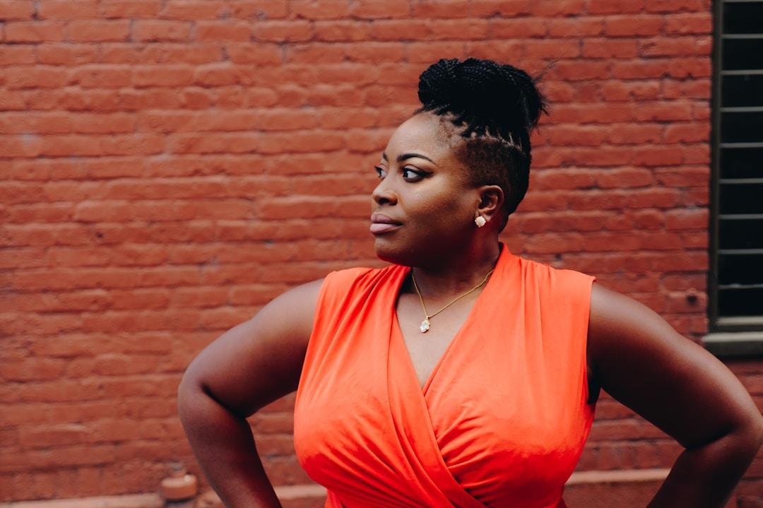 a woman in an orange dress