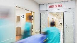 A blurry image of a hospital emergency room

Description automatically generated