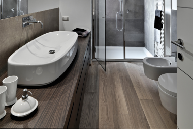 things to consider while designing your bathroom remodel luxury vinyl plank flooring custom built michigan