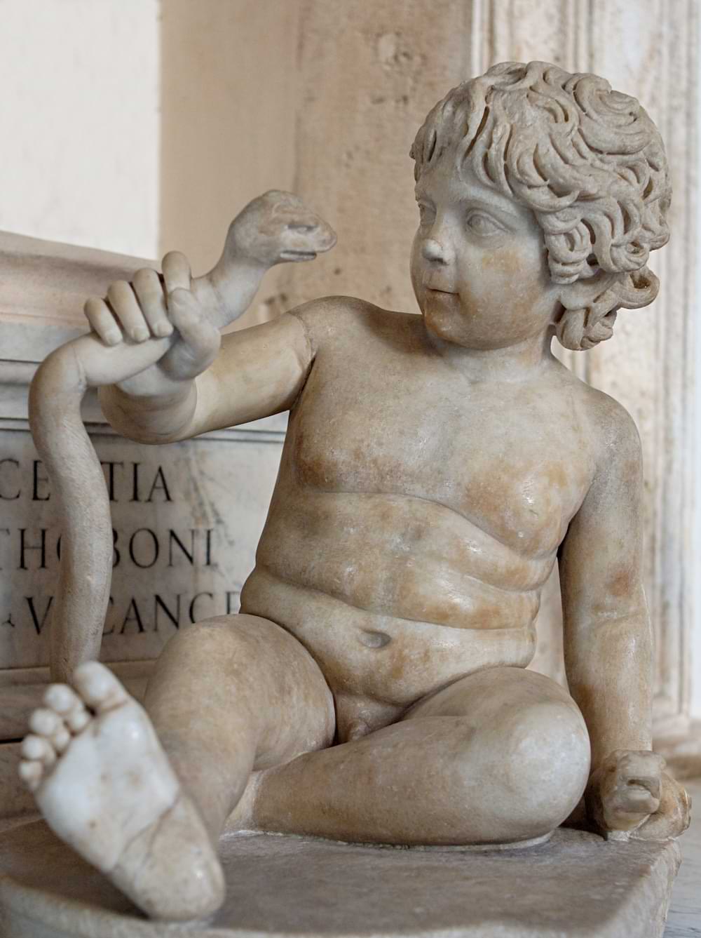 Baby Hercules strangling a snake sent to kill him in his cradle, 2nd century CE