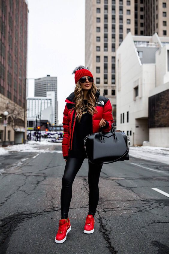A leather leggings outfit and red sneakers are perfect for casual outings