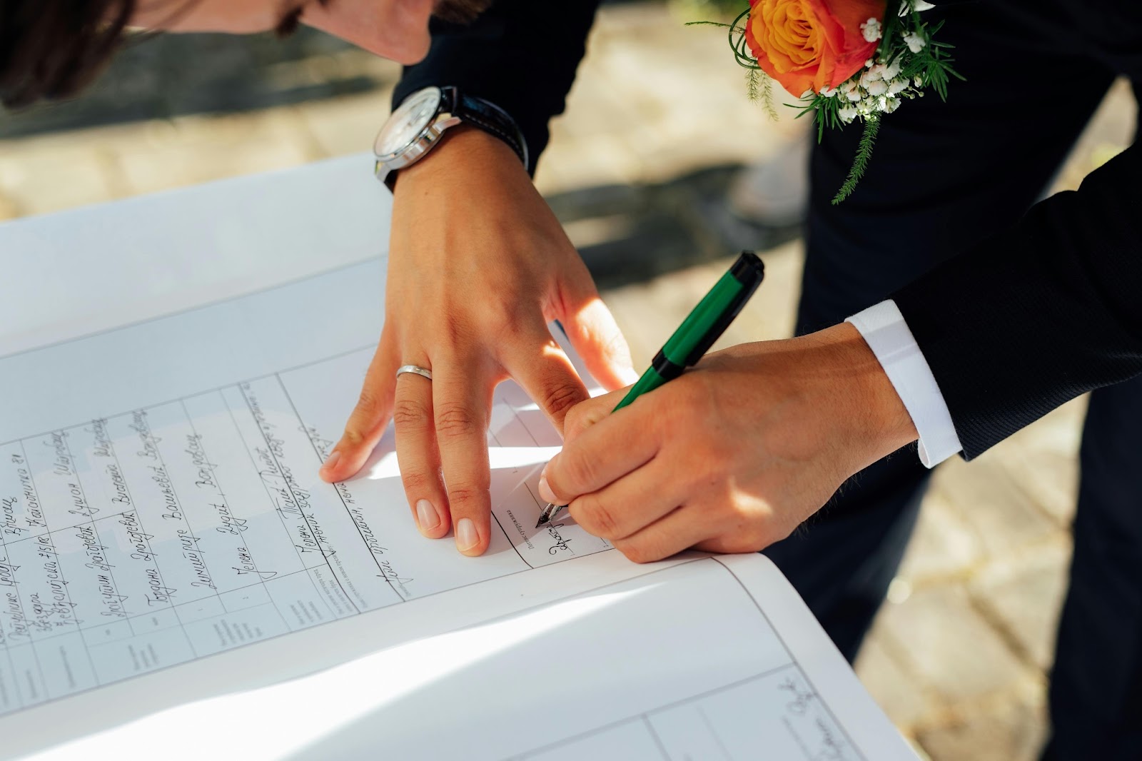 Legal documents and passports arranged neatly on a table for a destination wedding.