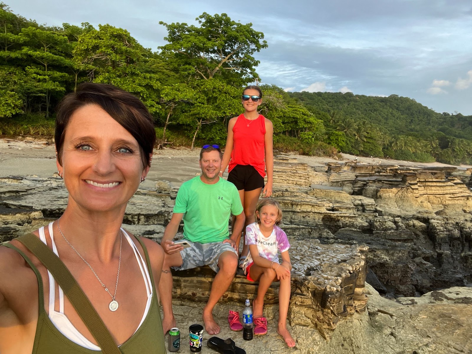 After a day of work or travel in Costa Rica the Pitts family watches the sun set on the beach!