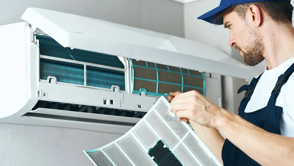 A skilled technician conducting regular air conditioner check-ups