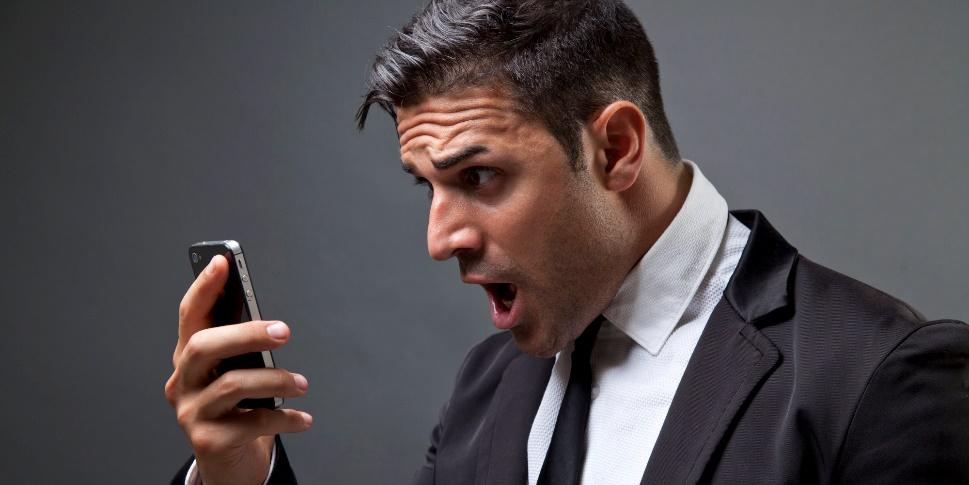 Image result for man scared looking at phone