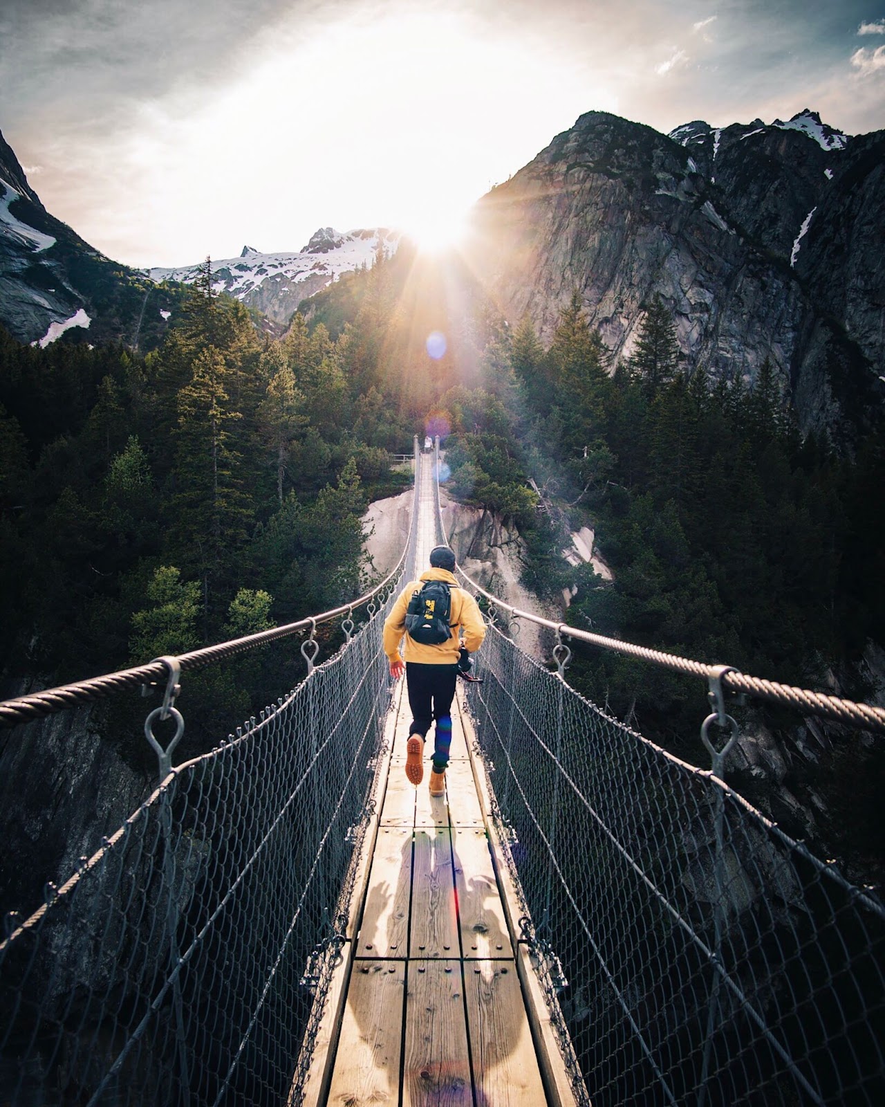 Swinging bridge in the mountains
