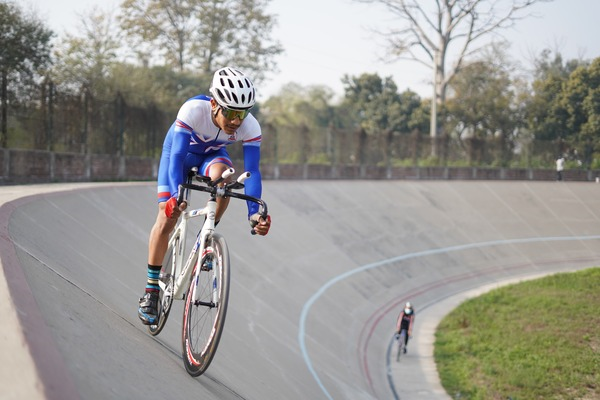 Cyclist on a Velodrome