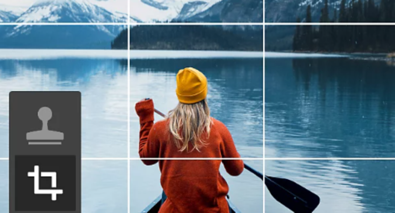 Image from Adobe website of a woman paddling on a glacier lake.