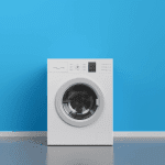 white washing machine with blue background