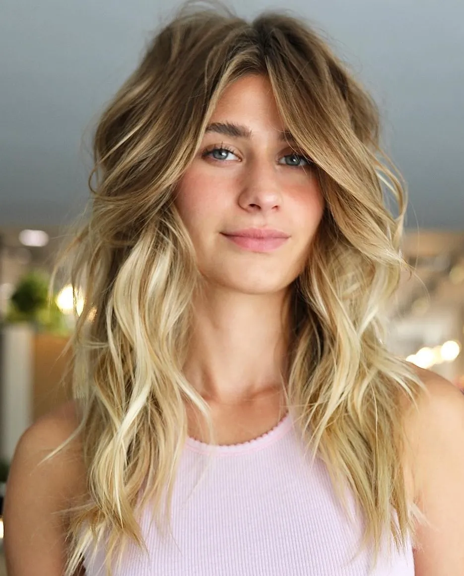 Picture of a lady wearing the Ombre Curtain Bangs with Layers
