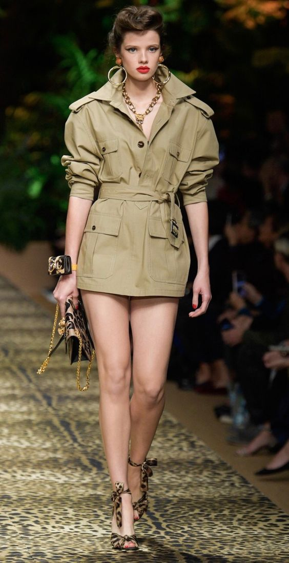 Picture of a lady dressed in a khaki short gwon