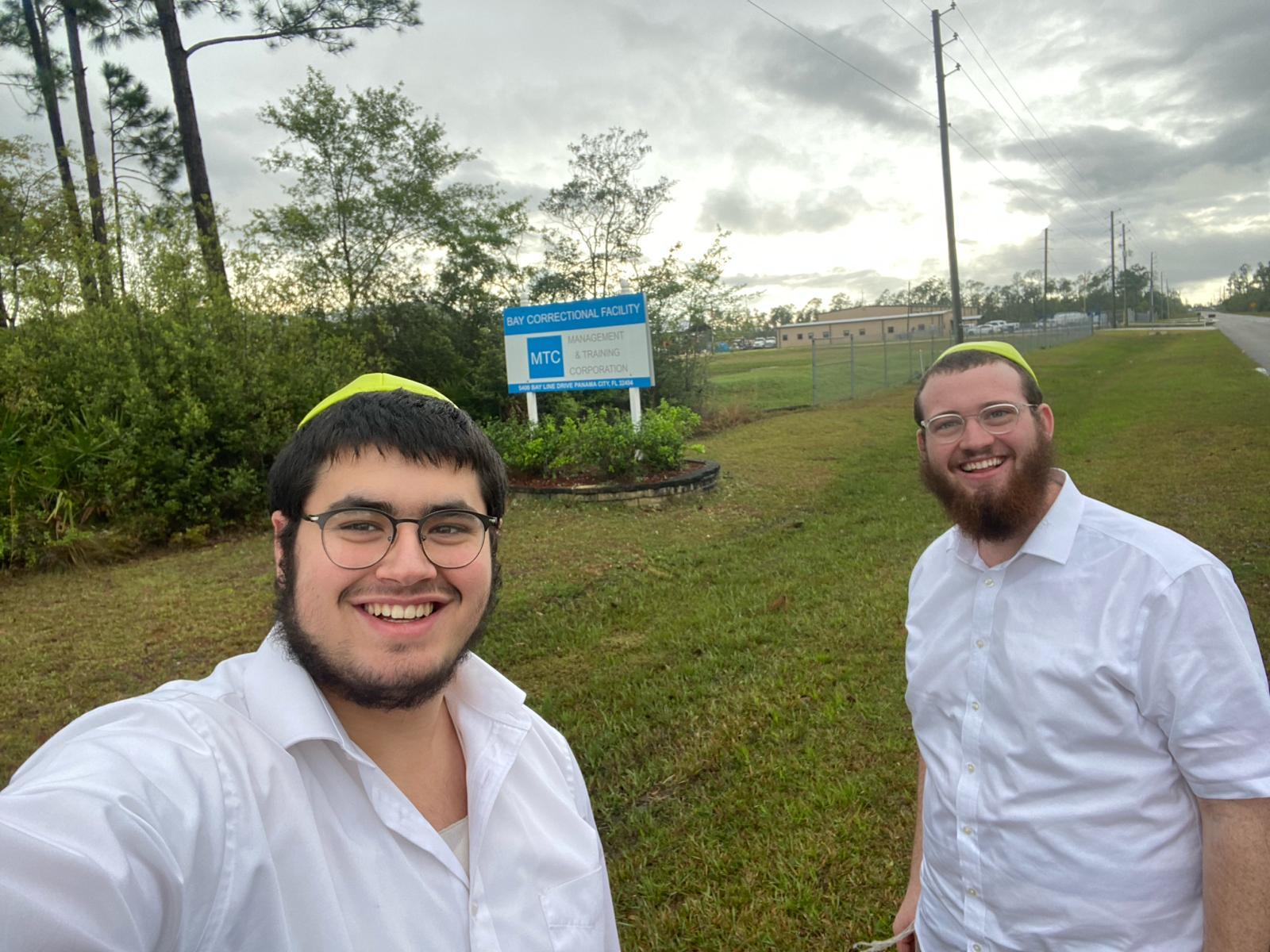 Two men taking a selfie

Description automatically generated