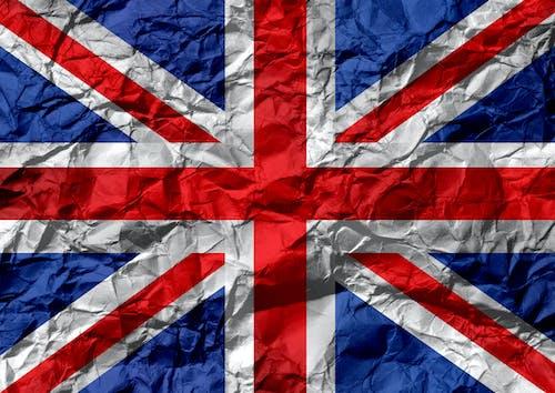 Free UK flag on creased paper Stock Photo