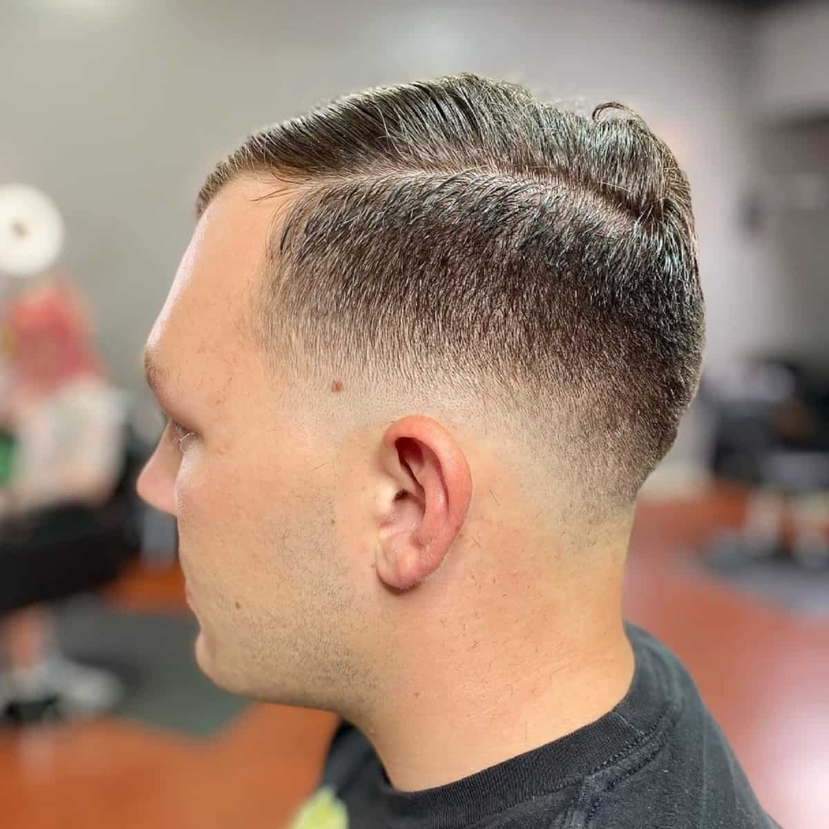 Side view of a guy rocking the military fade haircut