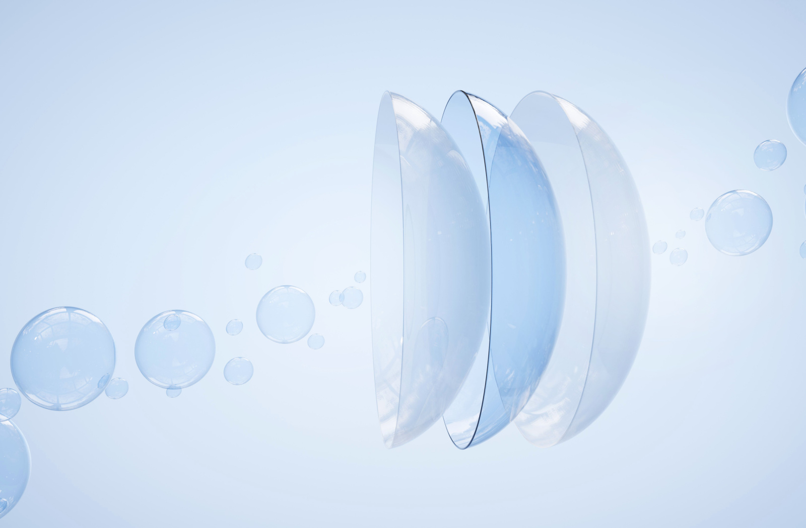 A digital graphic showing contact lenses with three different layers, looks as if the contact lenses are floating
