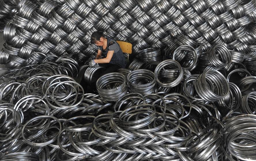 https://foreignpolicy.com/wp-content/uploads/2023/10/china-economy-manufacturing-steel-GettyImages-967172236.jpg