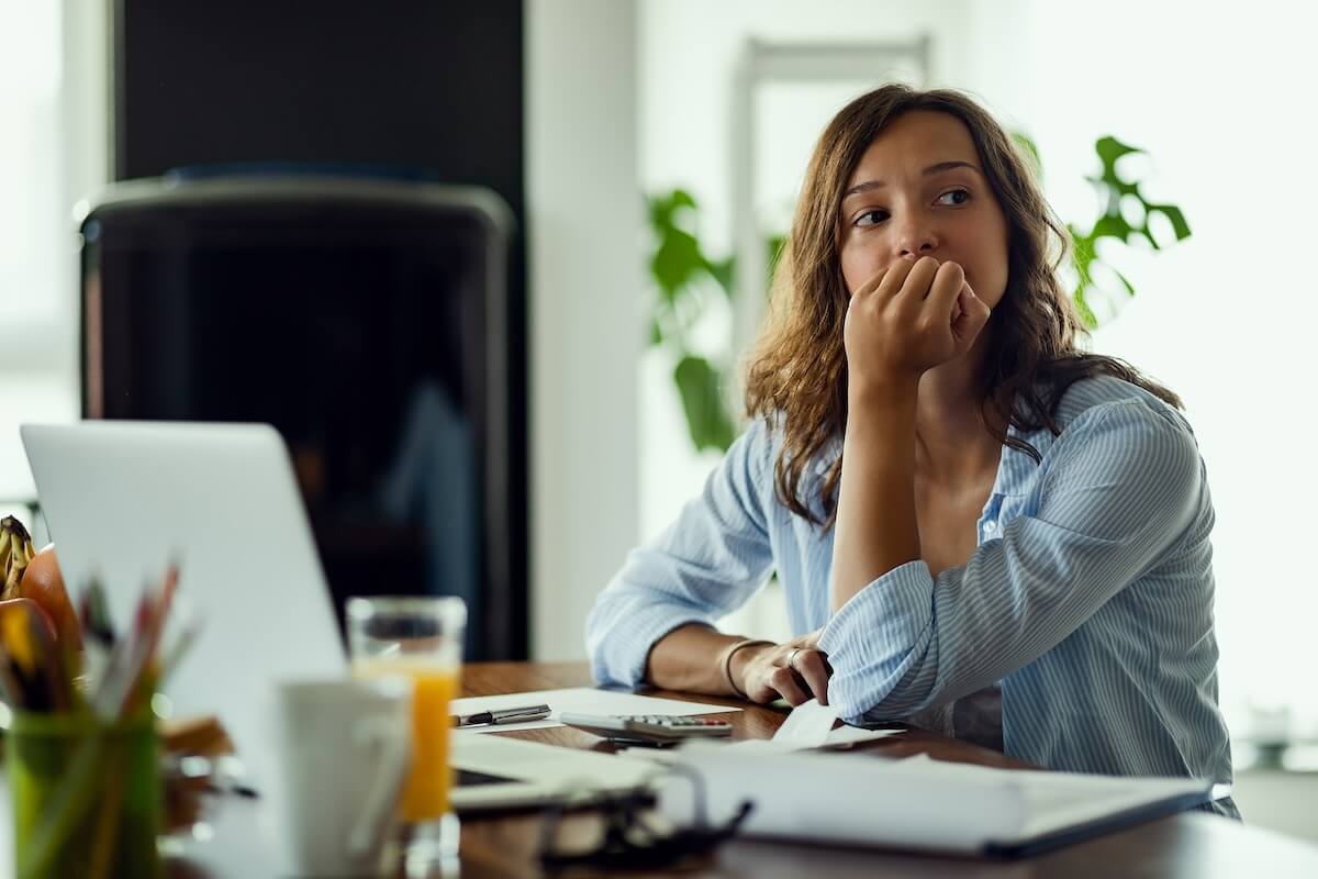 Worried entrepreneur at her office