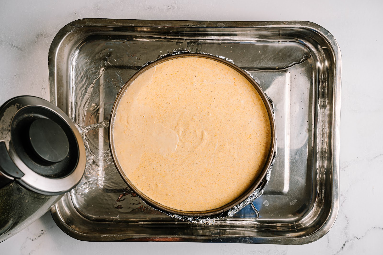 Set up the water bath to bake the cheesecake.