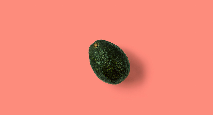an avocado on flat background