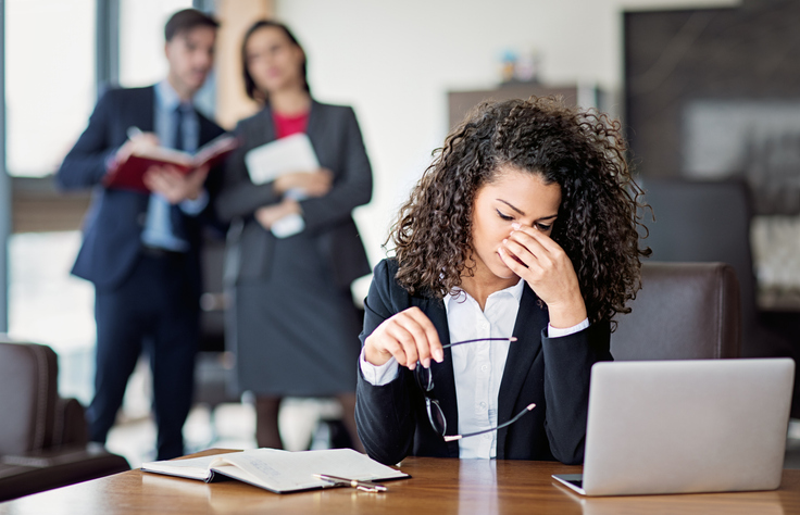 disappointed woman looking at laptop 