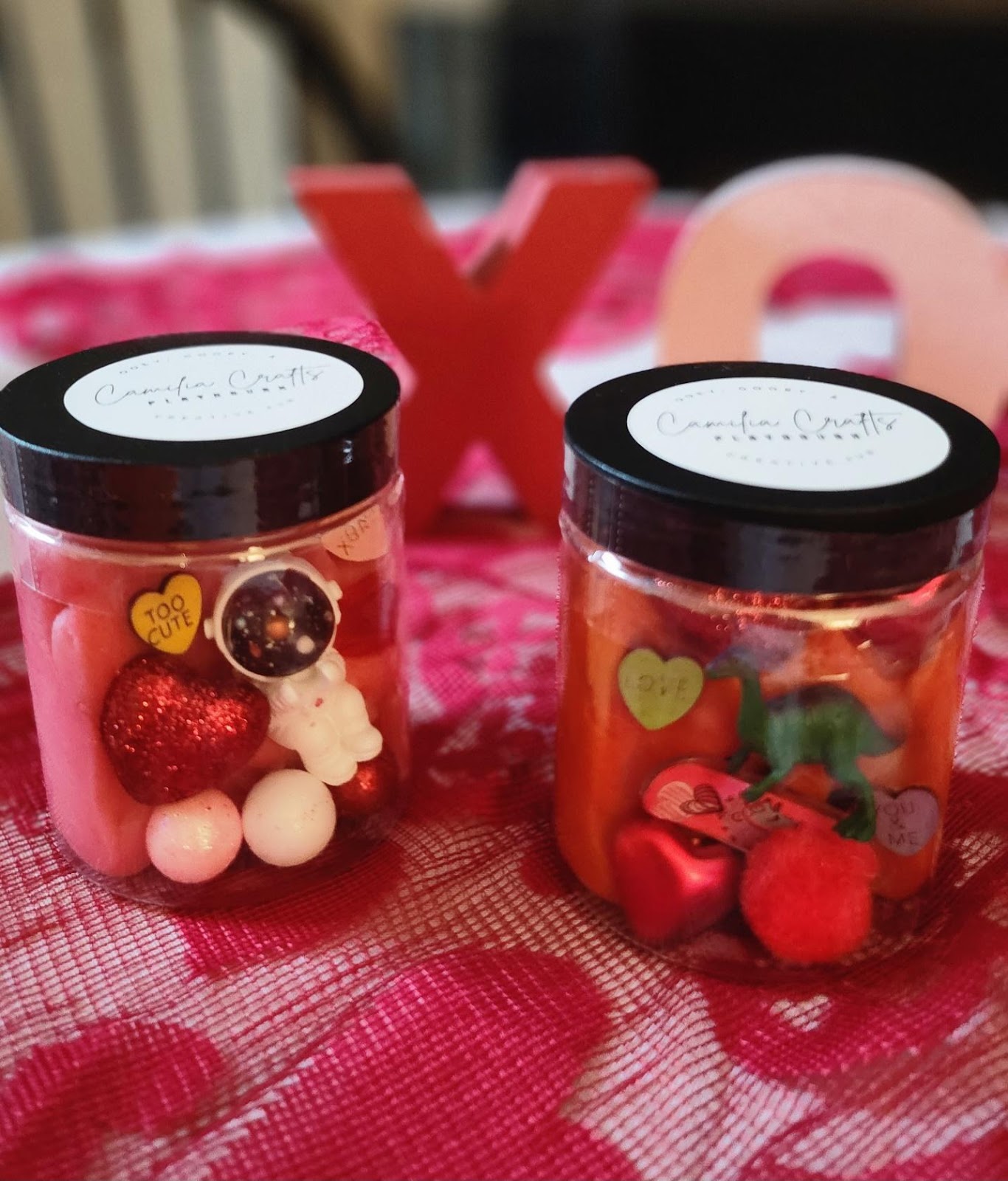 A couple of jars with candyDescription automatically generated with medium confidence