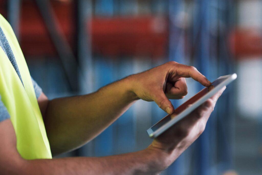 Sodium bentonite for sale: construction worker researching materials