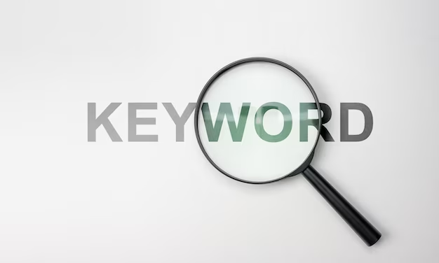 A magnifying glass on top of the word "keyword"