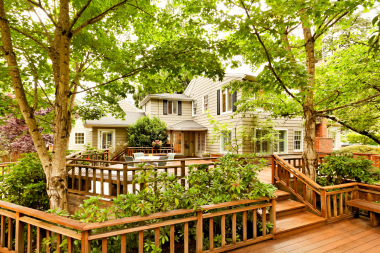 benefits of adding a new deck to your home wood decking with trees custom built michigan