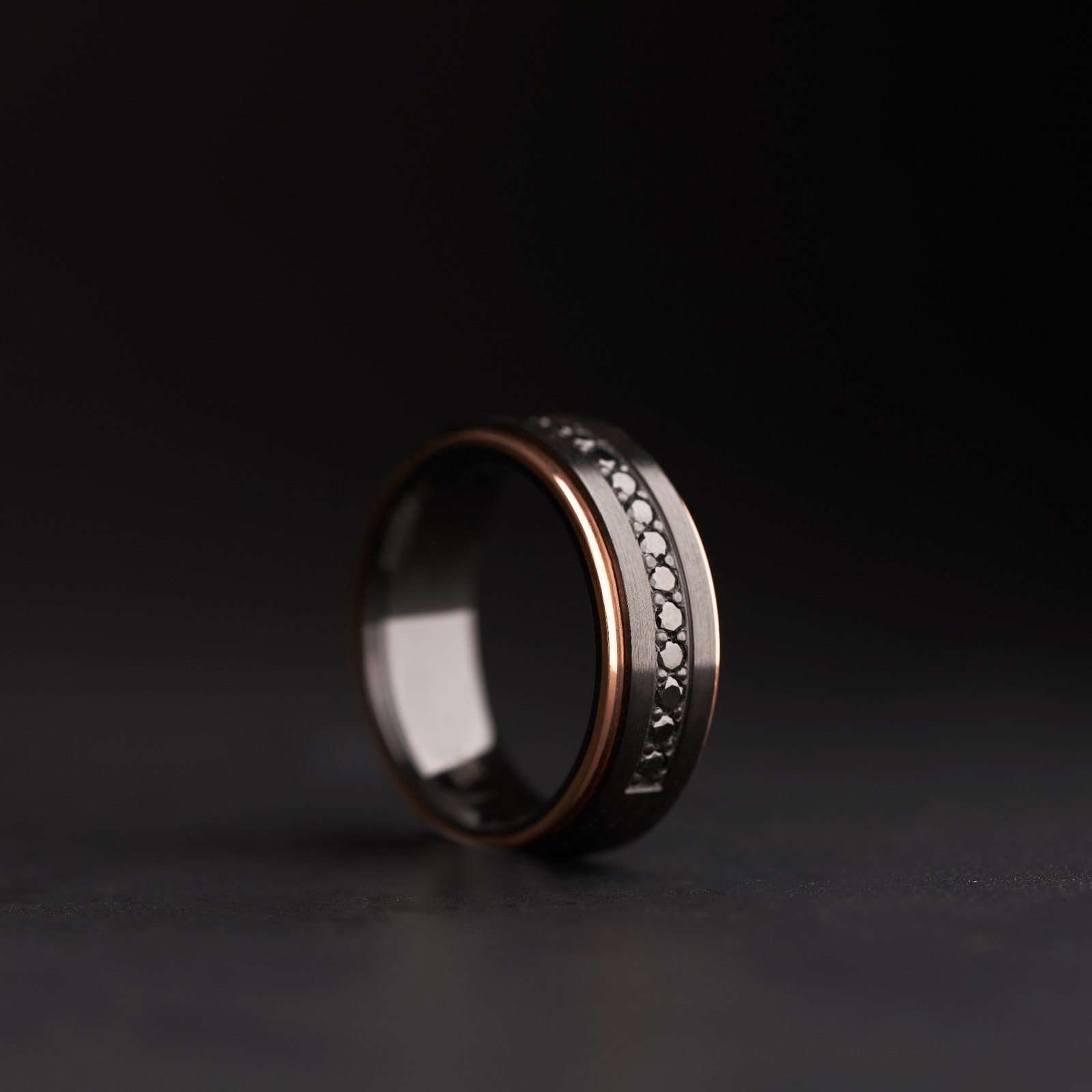 diamond studded black and gold wedding band