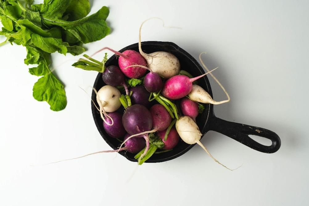 A picture containing indoor, radish, vegetable, fruit

Description automatically generated