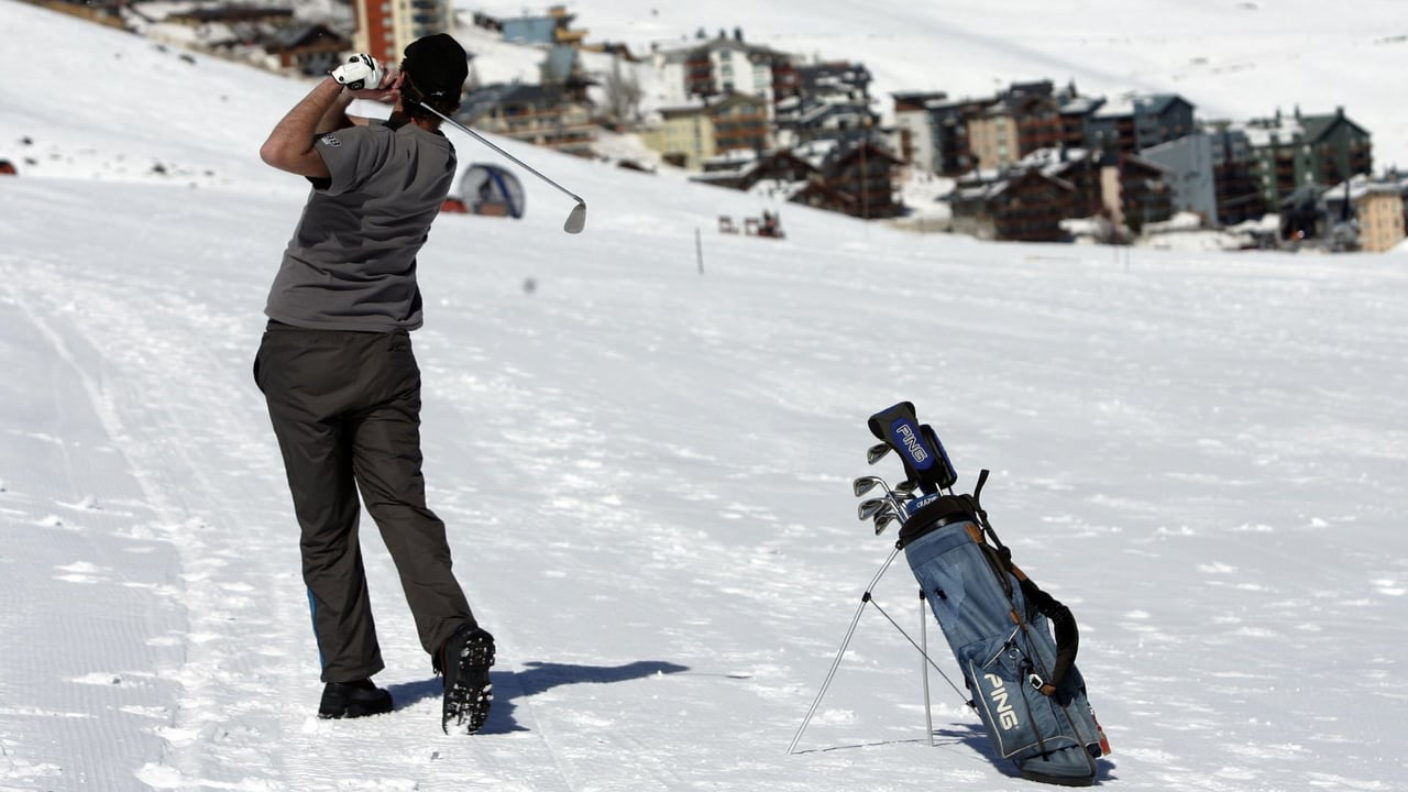 Golfer in park city swinging