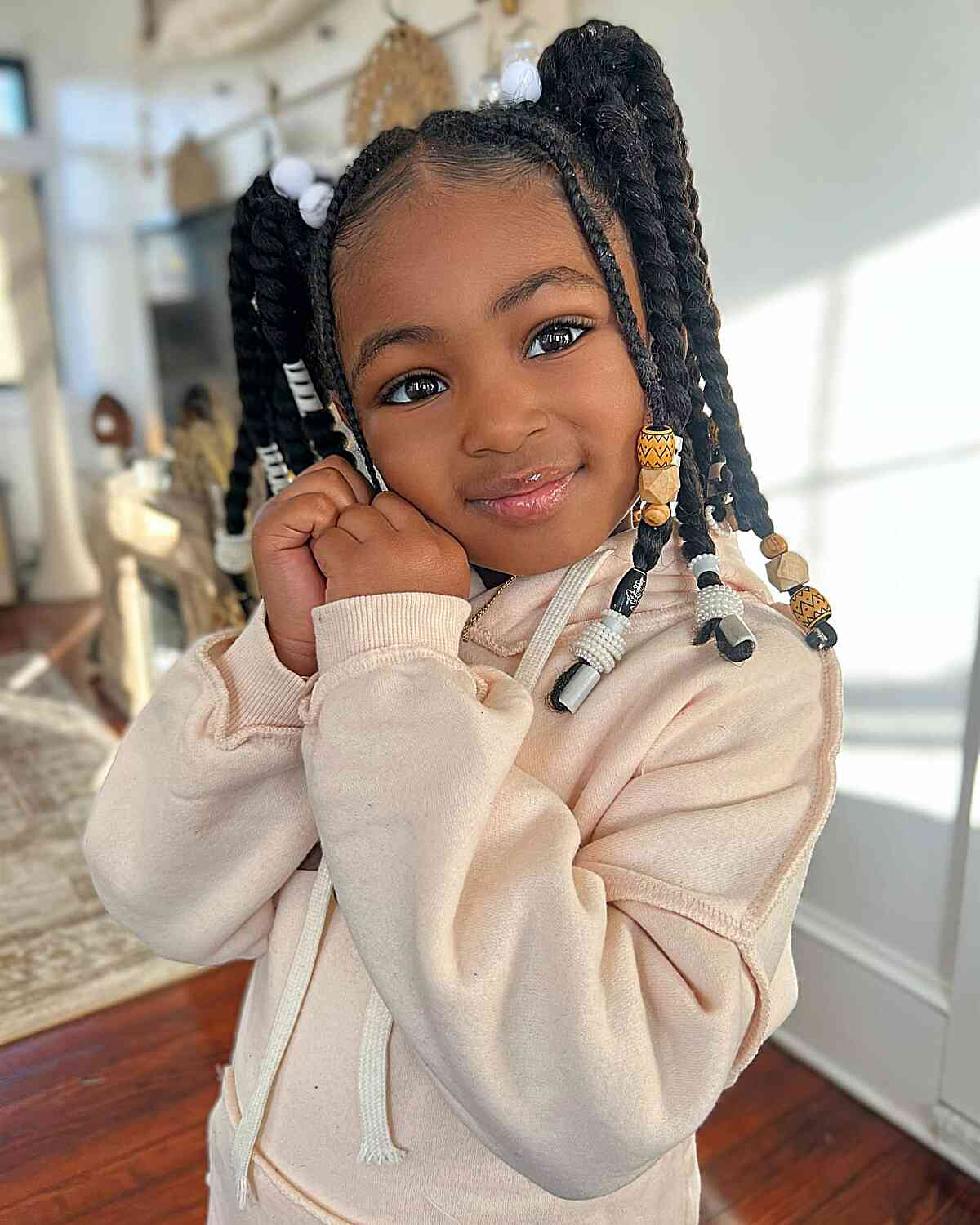Black girls hairstyle: Picture  of a gorgeous girl  rocking braids with beads