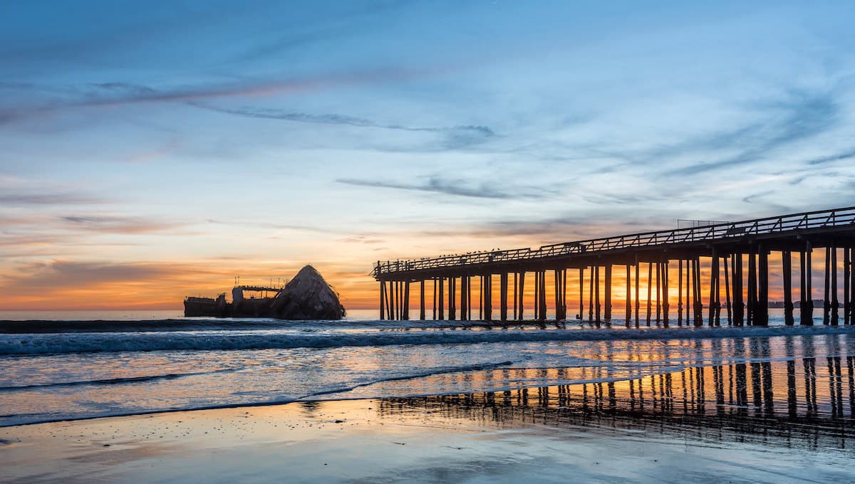 Tall Pier and the SS Palo Alto in the water at Seacliff State Beach at Sunset